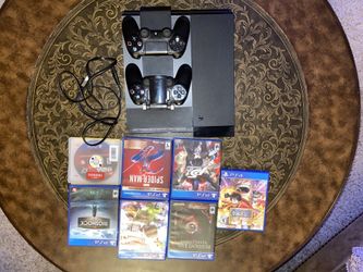 PS4 Console with Two Controllers And 7 games