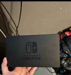 Nintendo switch (comes with charging dock )