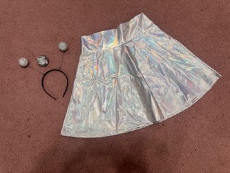 Shimmering holographic silver A-line skirt with a flattering high waist. Smooth, reflective fabric adds eye-catching shine for parties and events. Als