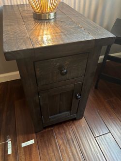 Dark brown and table with drawer and cabinet