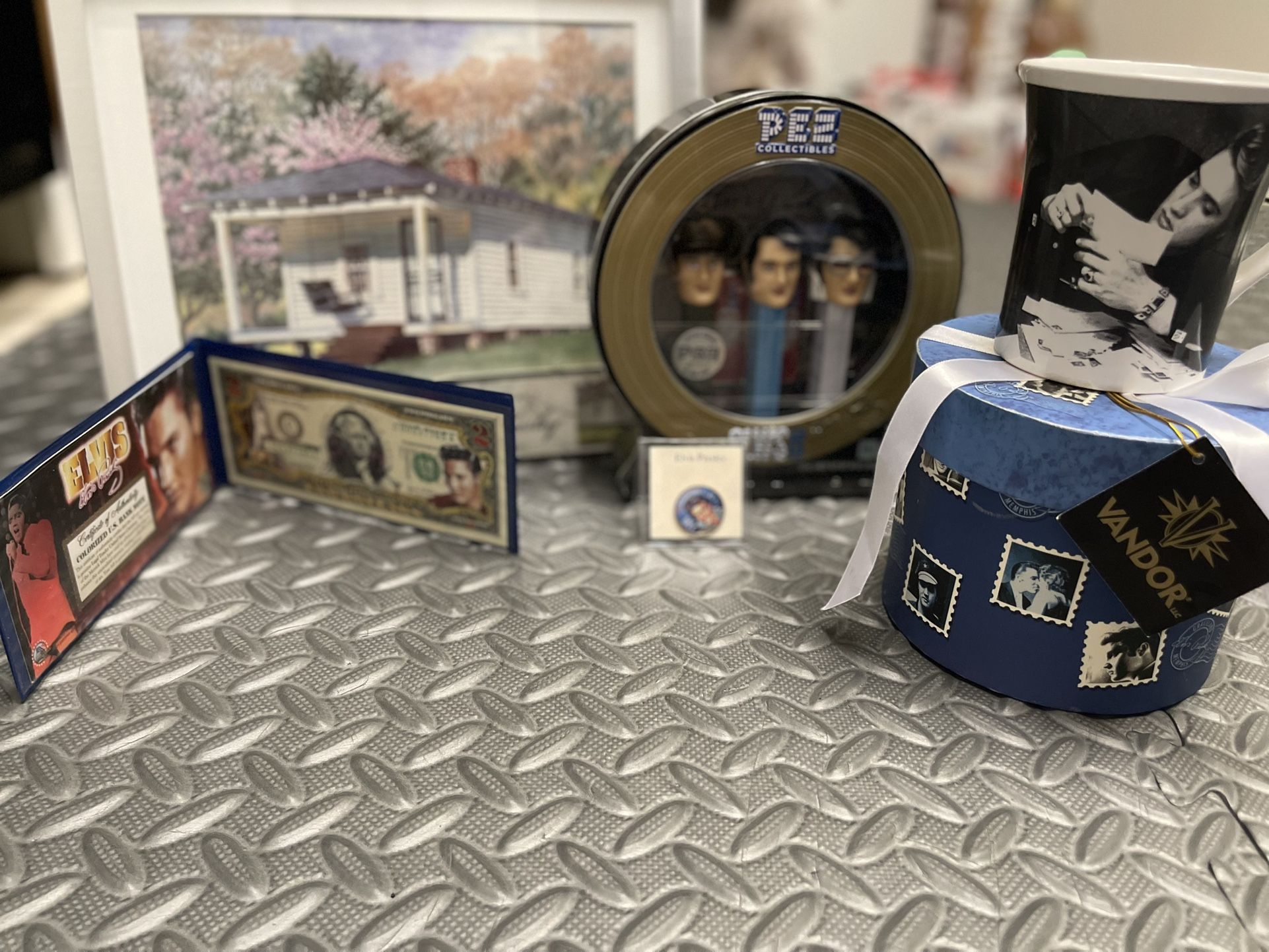 Elvis Presley Collectible Memorabilia-Coffee Mug, two dollar bill, quarter. Etc