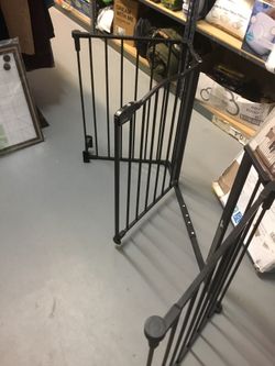 Baby gate or pets gate it’s new in box opening up to 74 inches wide adjustable