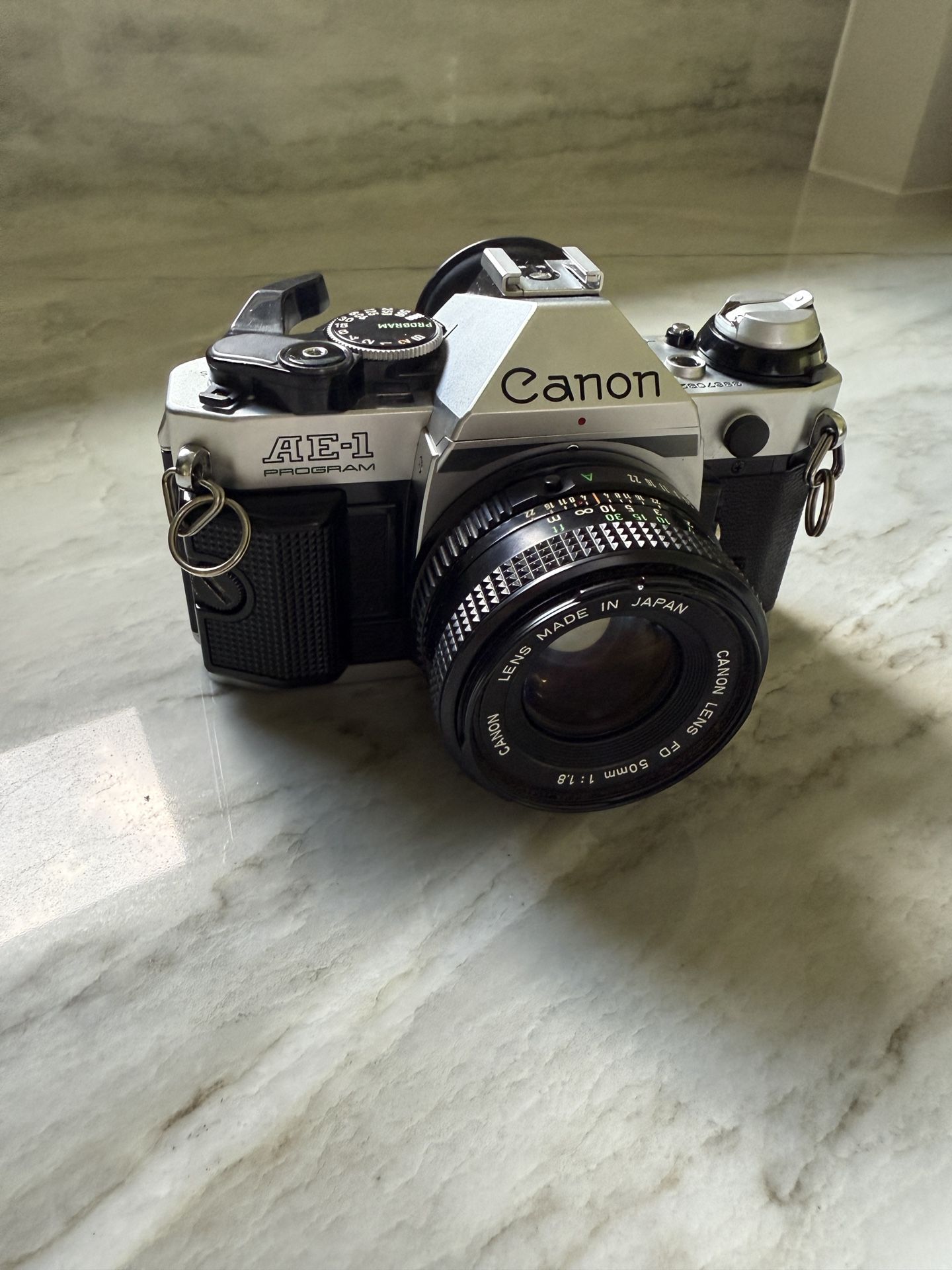 Canon AE-1 Program 35mm Manual SLR Film Camera with 50mm 1:1.8
