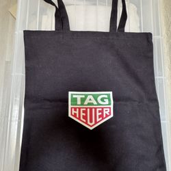Tag Heuer Tote 14”x16”. Total Length From Handle 27”al- Brand New