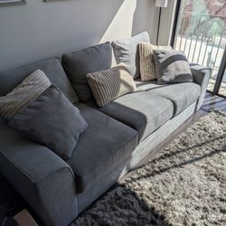 Deep Grey Couch Three Cushions
