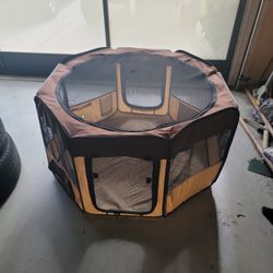Playpen For A Puppy Or A Cat Has A Little Hole In The Top Of The Net In Used Condition