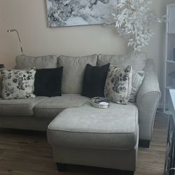 Gray Tone Couch With Pillows 