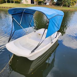 Boat With Bimini Shade Iike New, Great Condition  Comew With Working Trolling Motor And Battery With Waterproof Case And Oars 