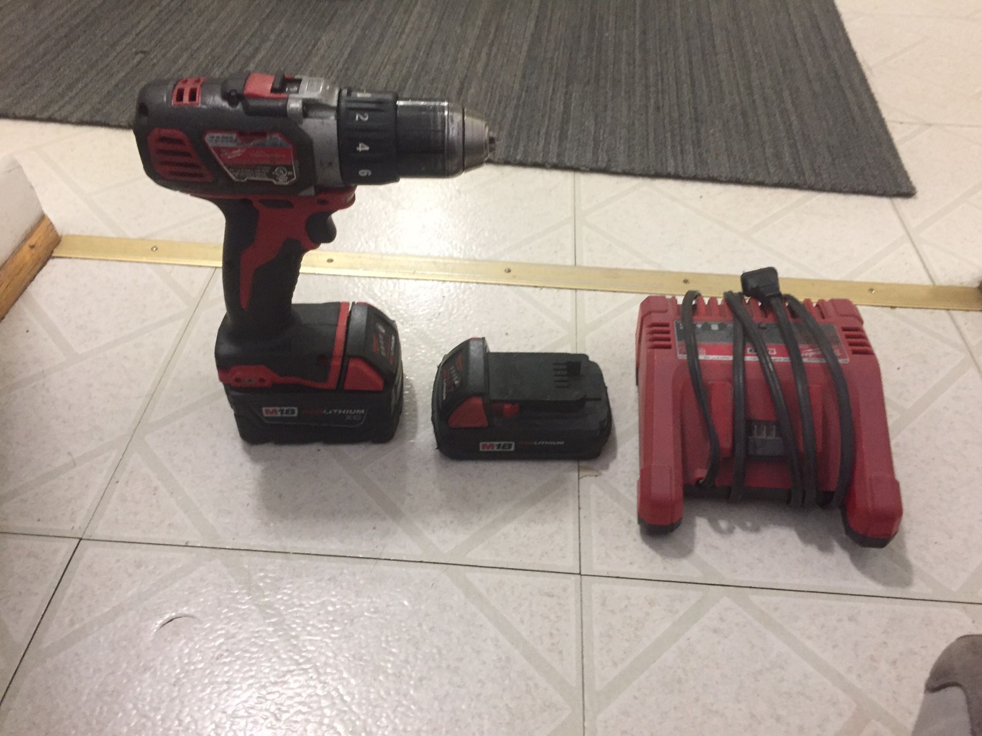 Milwaukee drill 2 batteries and charger