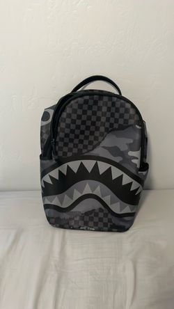 Spray ground backpack