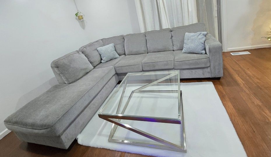 Sectional with chaise and glass coffee table