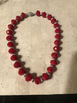 Large Red Crystals and silver tone beads. Magnet closure with Rhinestones!