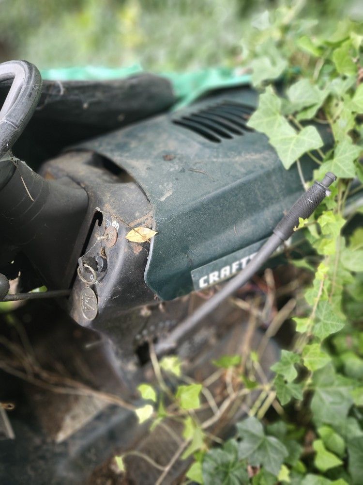 SEATED MOWER