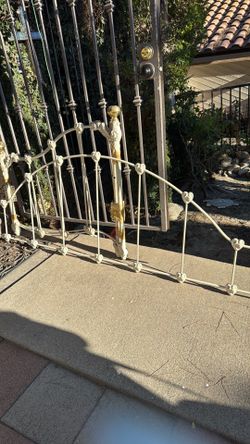 Cream enamel and polished brass daybed, twin, headboard, and side rails