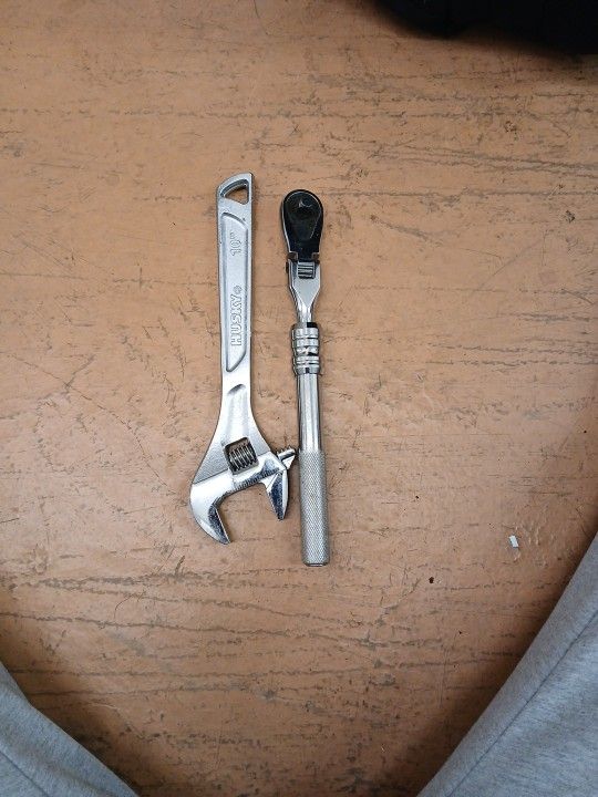 Adjustable Husky wrench In a stindo wretched