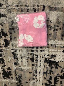 Pink denim tear sweater