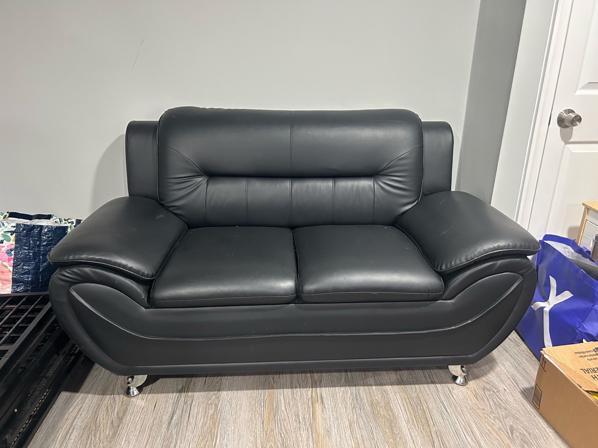 Black sofa w/ Love seat (leather)