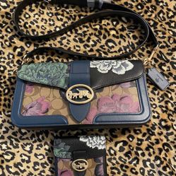 Authentic Coach leather purse , Floral Design .