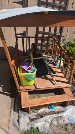 Sandbox, wooden and covered