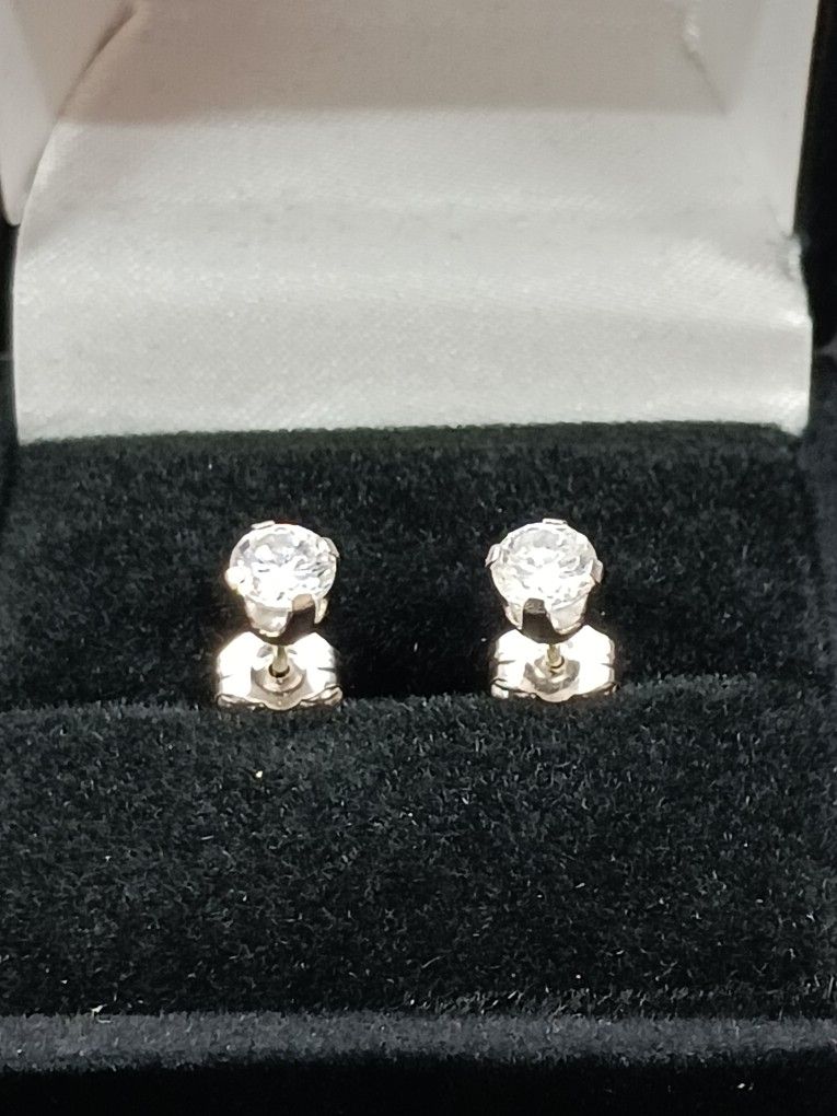 14k white gold stud earrings. CZ Diamonds