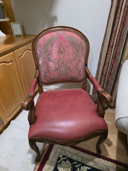 Elegant armchair large red leather bottom damask fabric back