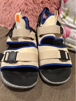 Nike Canyon Sandals in the "Fossil / Total Orange / Hypera royal