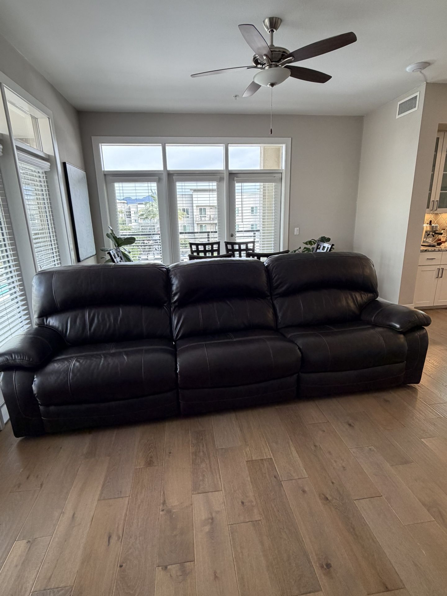 Dark Brown Leather Reclining Couch (taking best offer)