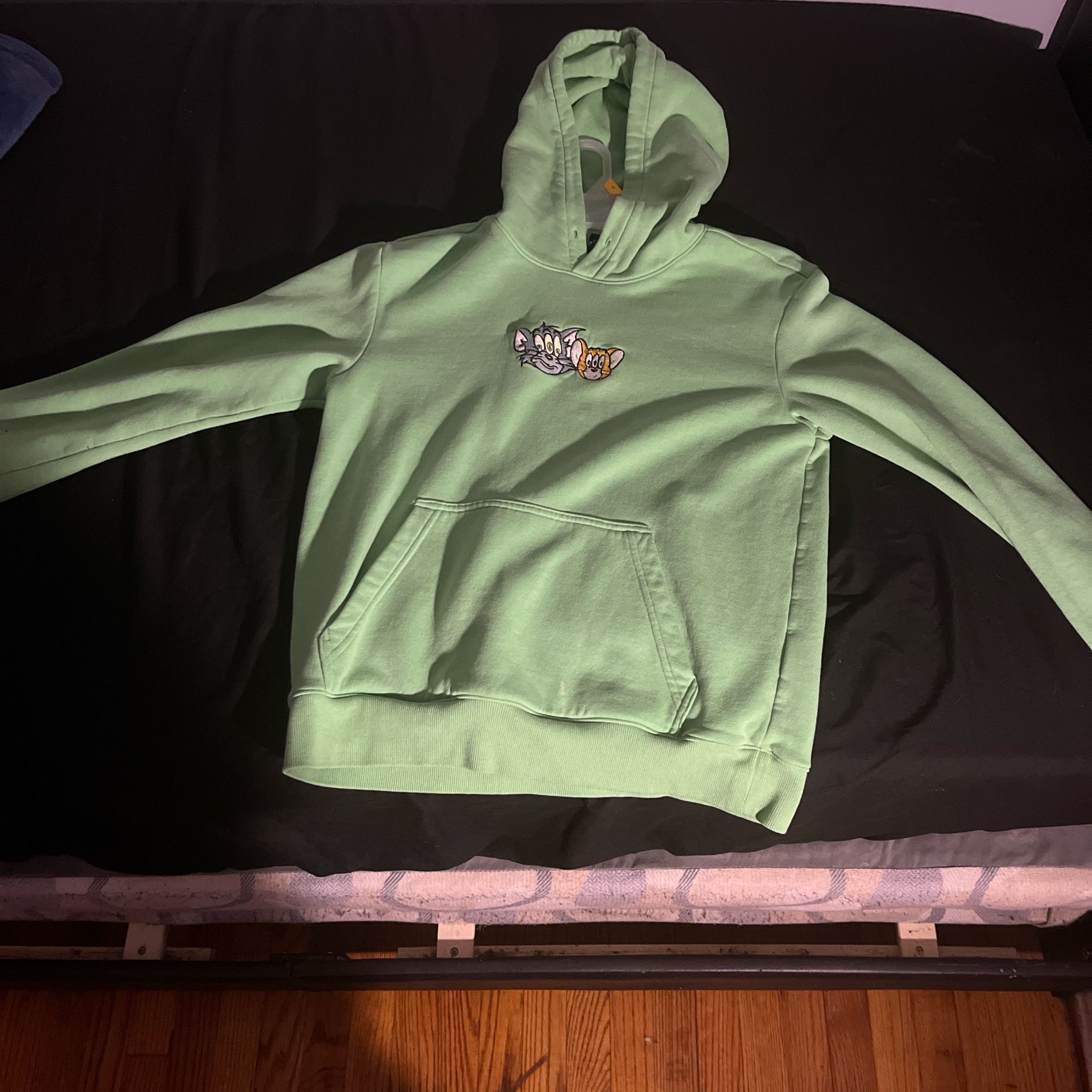 Green H&M Tom and Jerry hoodie. 