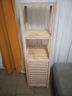 Teek wood shelving stand w/cabinet
