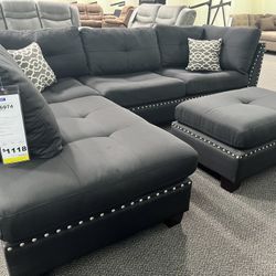 New Reclining Sectional .  Black .  104” X 75”.  Free Delivery !