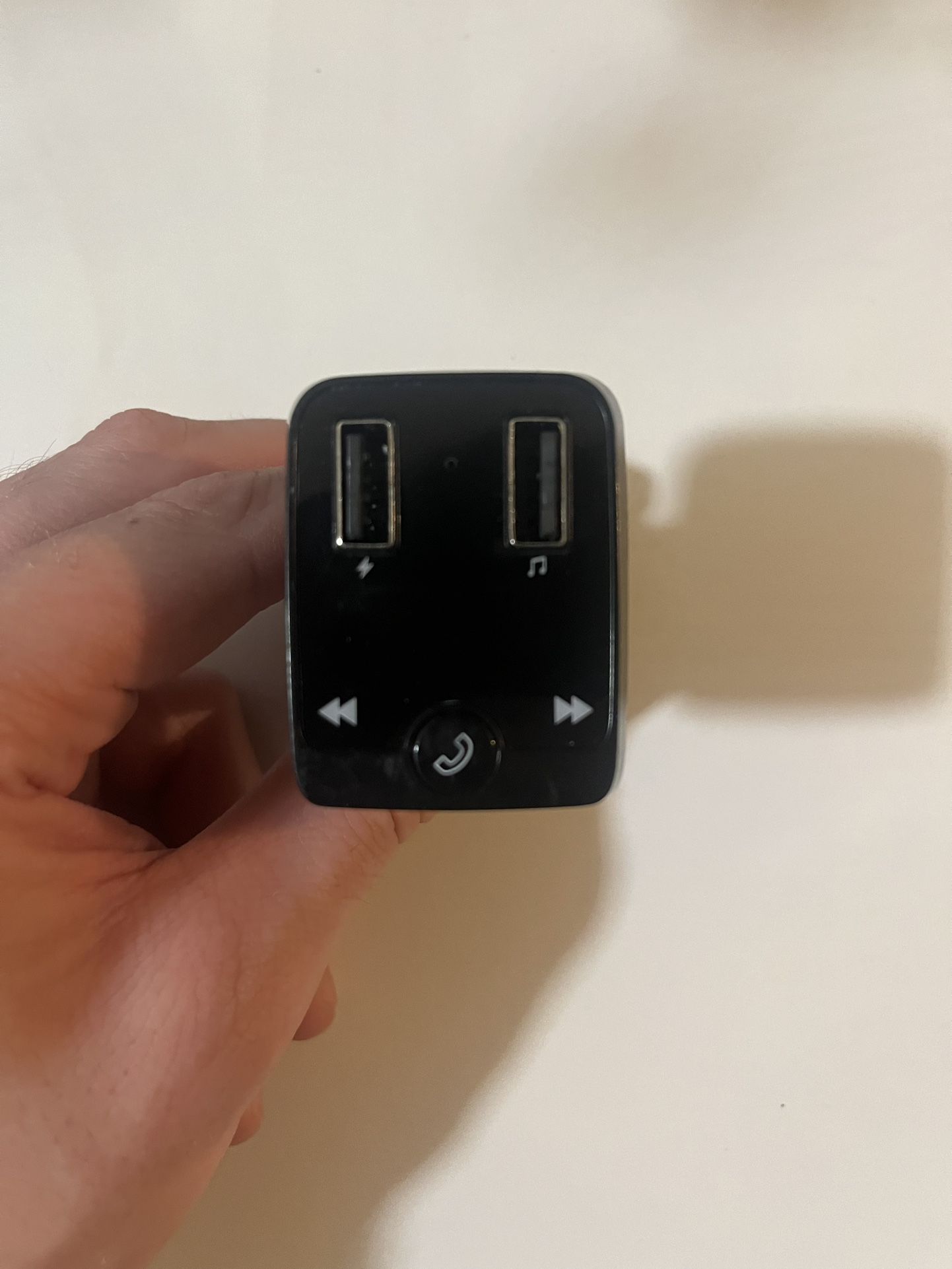Bluetooth FM transmitter and charging outlet