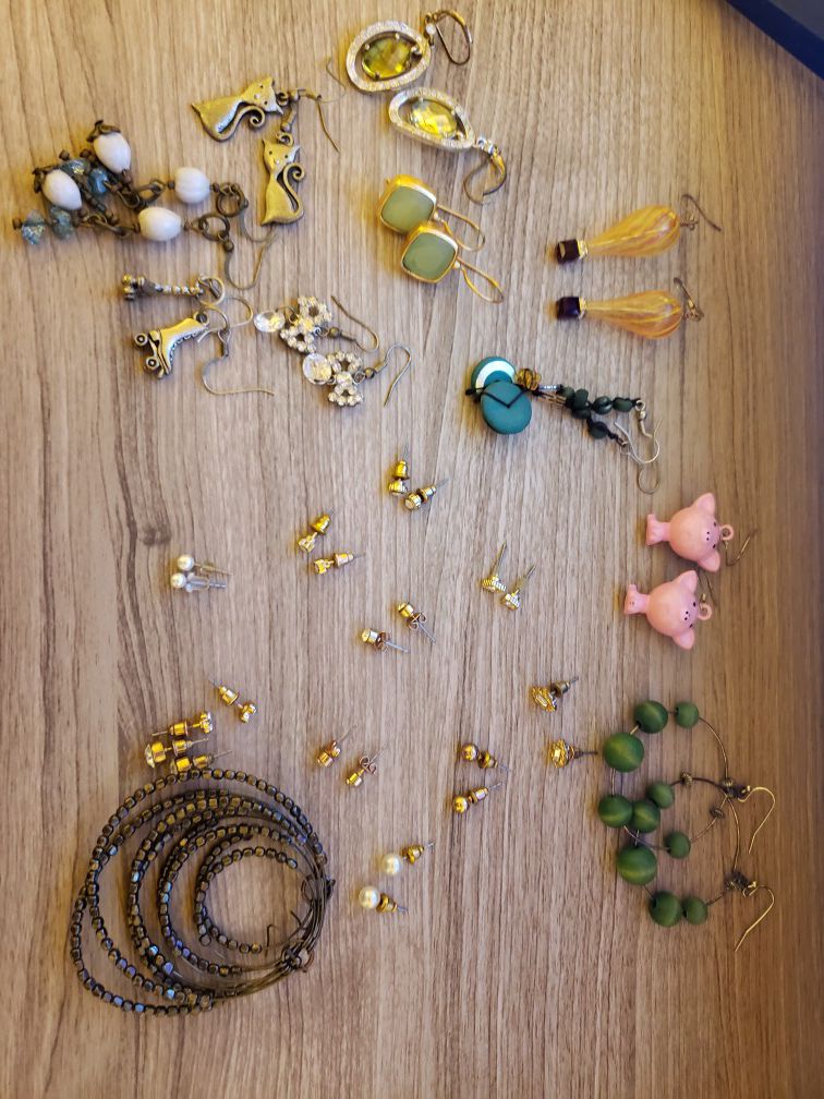 Dozens of pieces of costume jewelry! Necklaces, earrings, rings, and bracelets!