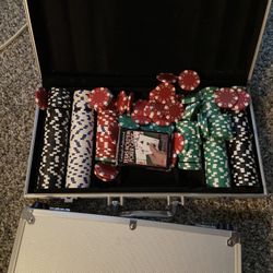 These are real weighed Poker Chip Set With Cards And Cases. 
