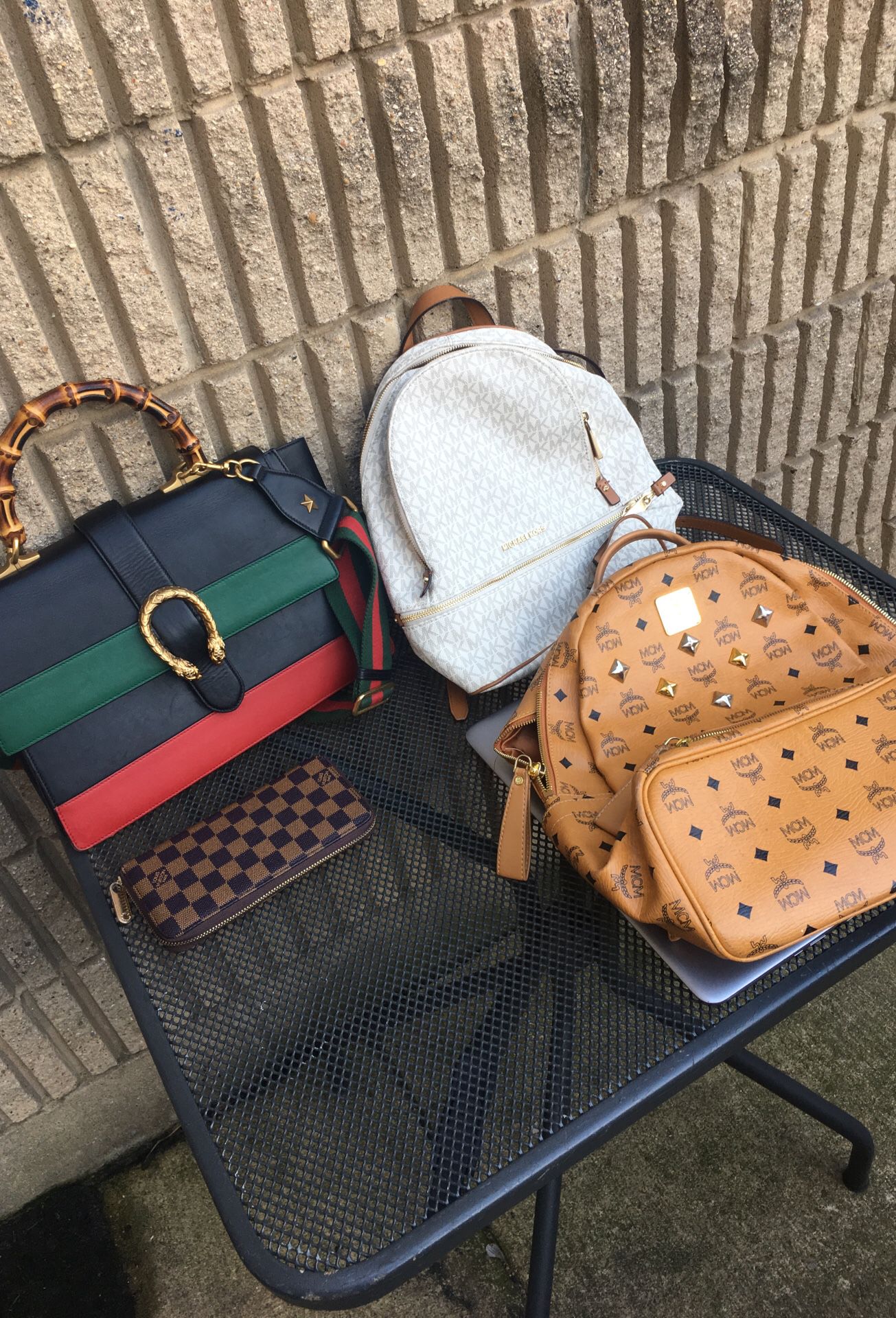 Michael kors , MCM, Gucci hand bag and Louis Vuitton wallet