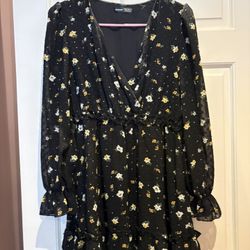 SHEIN black floral print smocked waist ruffle crepe mini dress. 