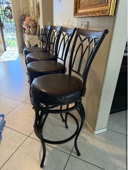 set of 4 heavy brown bar stool