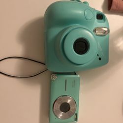 Polaroid camera and vivitar camera