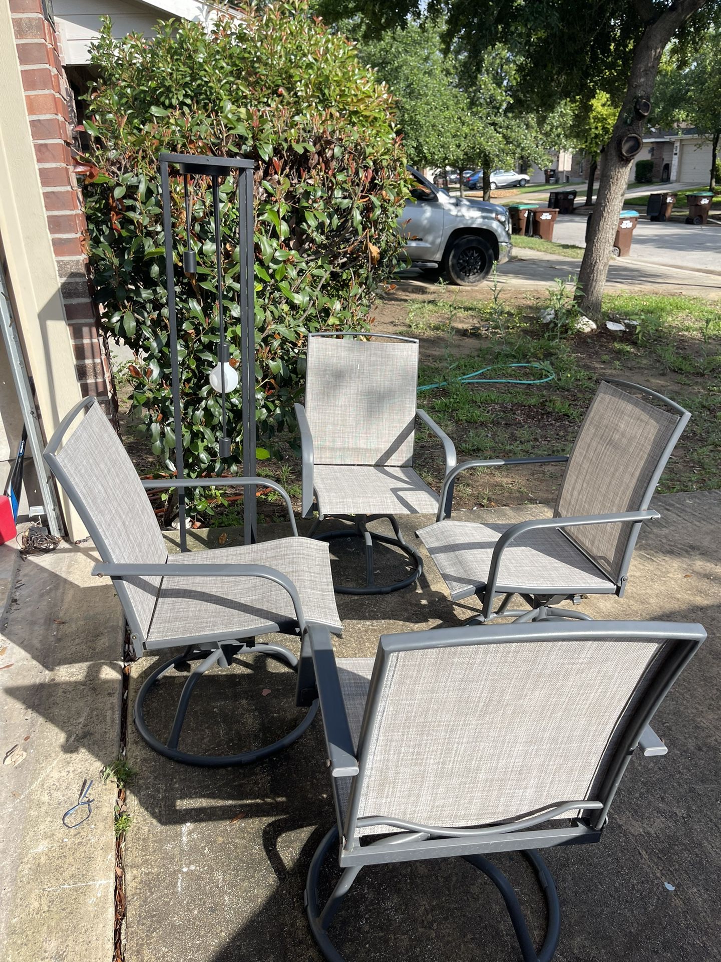 4 Patio Swivel Chairs 1 Table And Outdoor Lighting