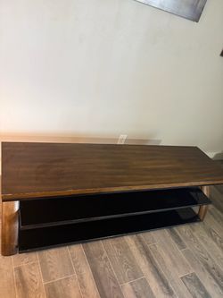 Wood and Black Glass TV Stand