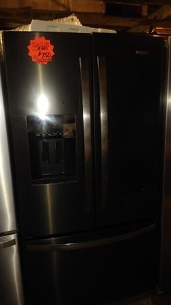 New Whirlpool French door fridge scratched and dented
