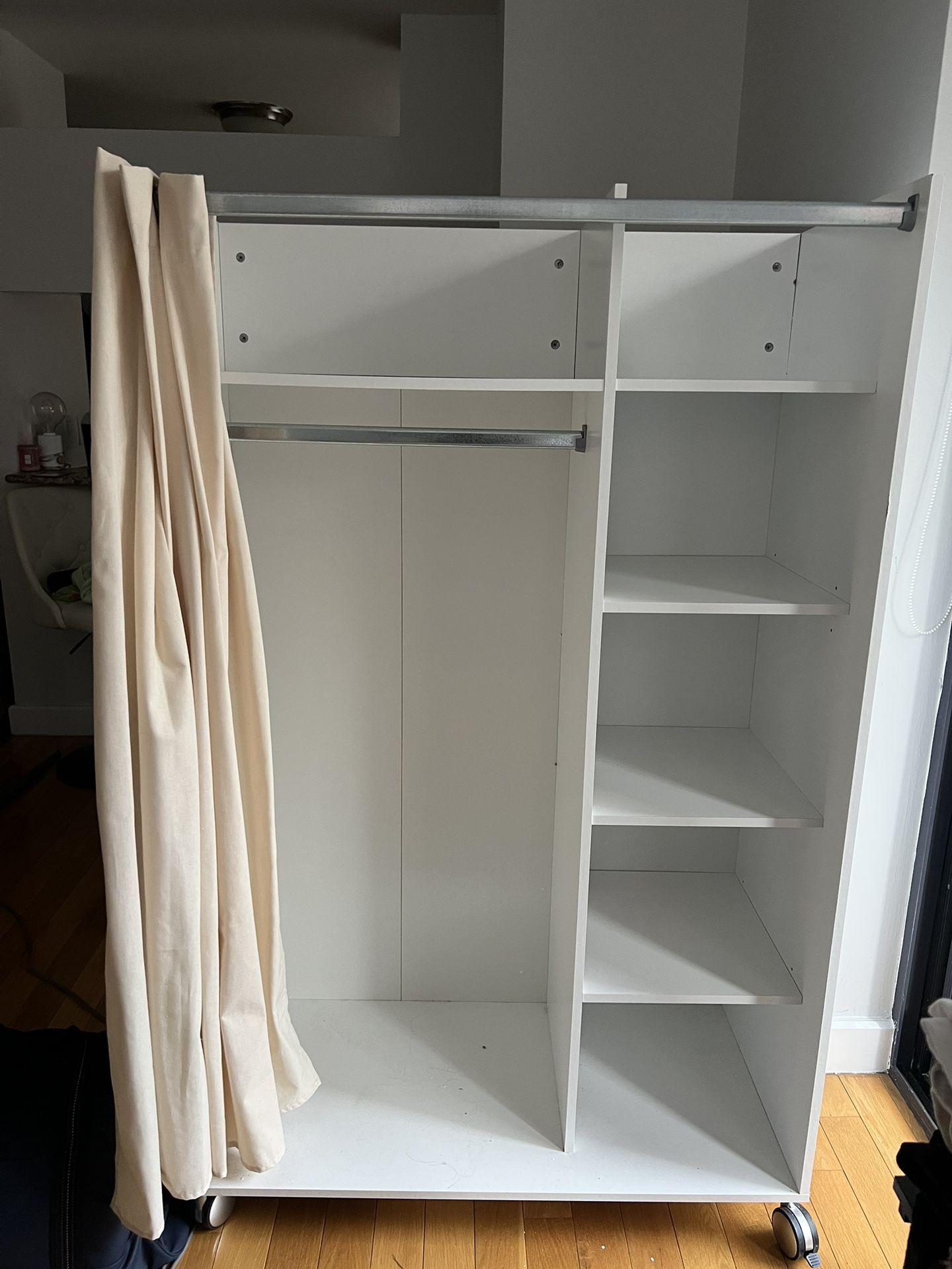 white wooden wardrobe / armoire