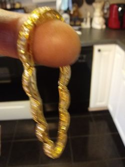 TENNIS BRACELET THIS IS COSTUME JEWERLY 60 DOLLARS REAL GOOD LOOKIN FOR COSTUME STUFF