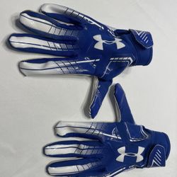 These are a pair of Under Armour F7 (or similar F-series like F8 or F6) football gloves in royal blue and white. 