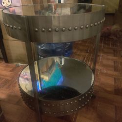 cocktail  metal and glass table w/ rollers