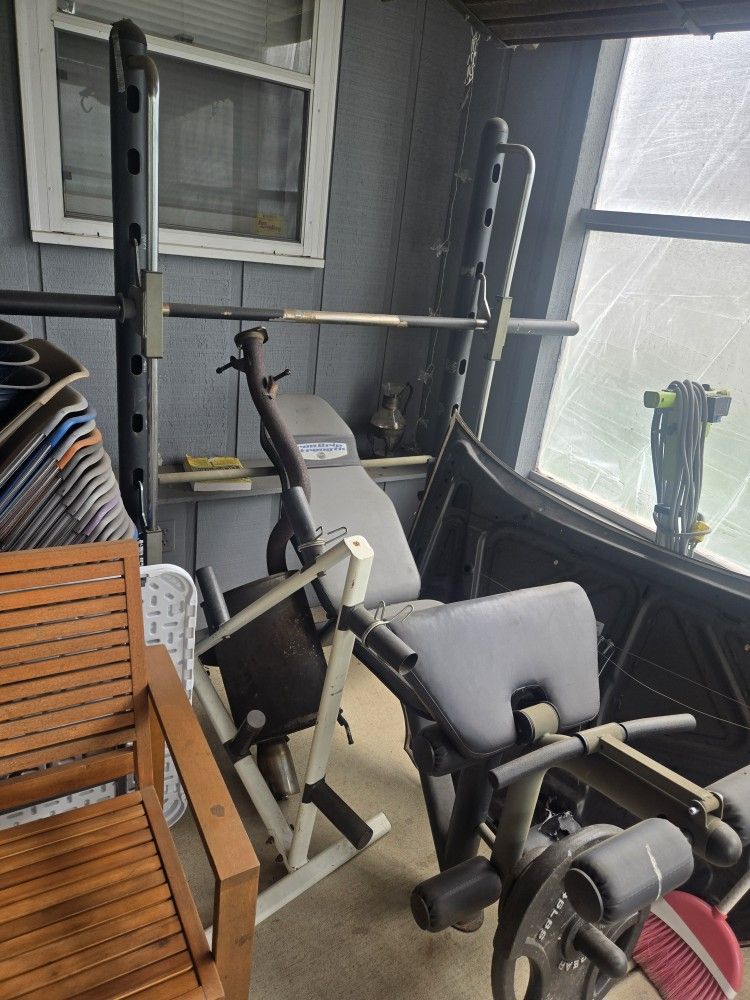Weight Lift Bench with some weights.