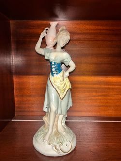 Porcelain Female Figurine with Vase