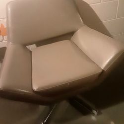 Unique Grey Leather Swivel Chair...