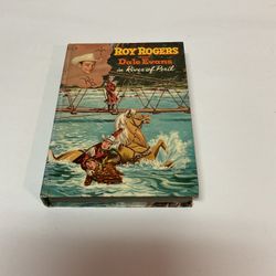 Vintage 1957 hardcover children's western novel titled Roy Rogers and Dale Evans in River of Peril.