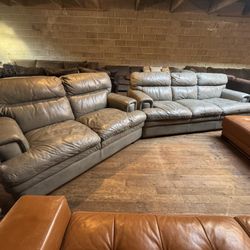Matching Gray Leather Sofa & Loveseat Set – Plush, Wide-Arm Design, Nail Head Accents “WE DELIVER”