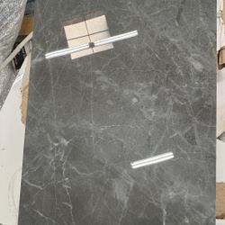 Black 2.1 Tiles (“12x24”) Polished.